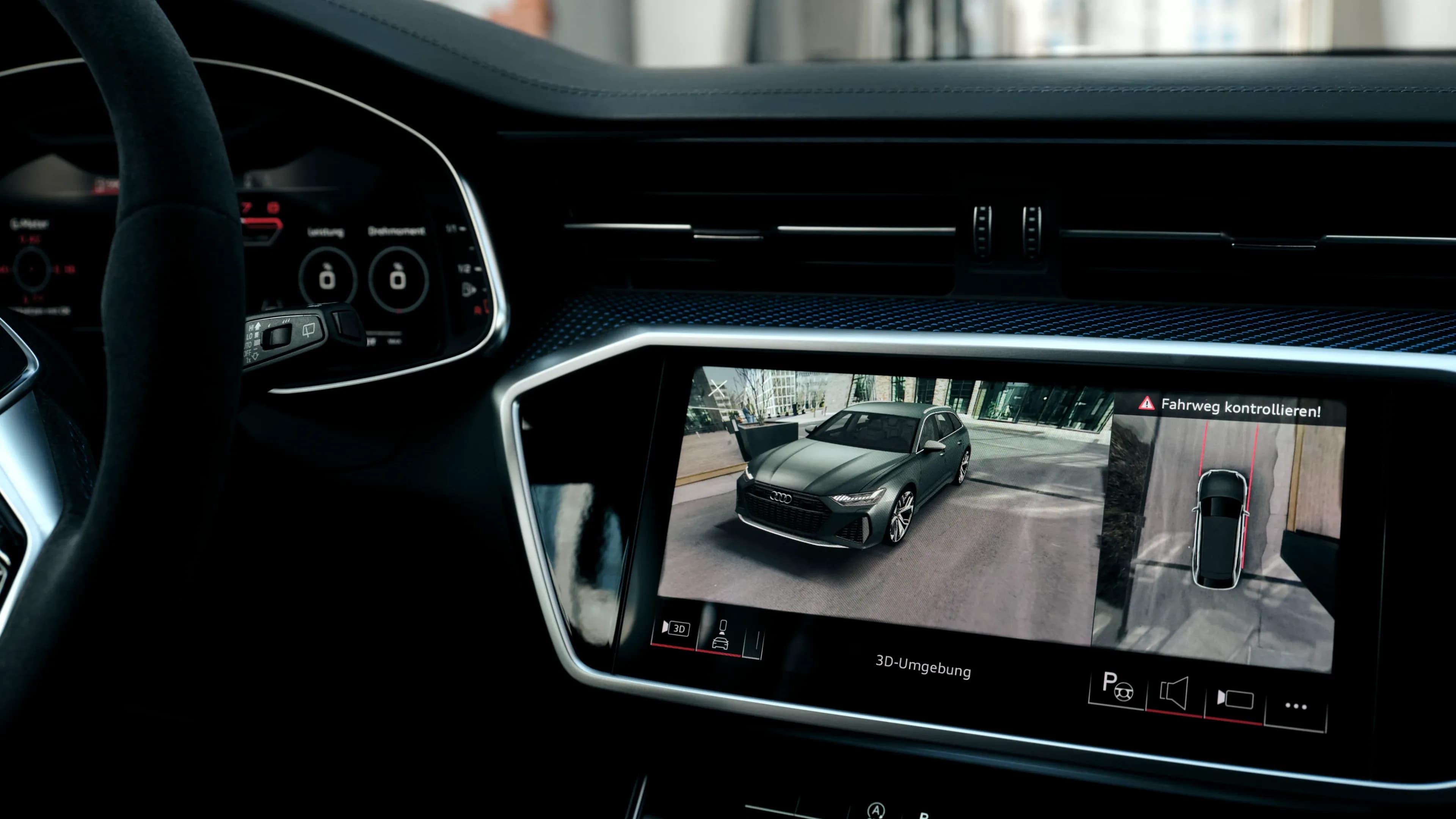 Audi RS6 Performance MMI touchscreen displaying the 3D surround camera view by Mosaik Motors.